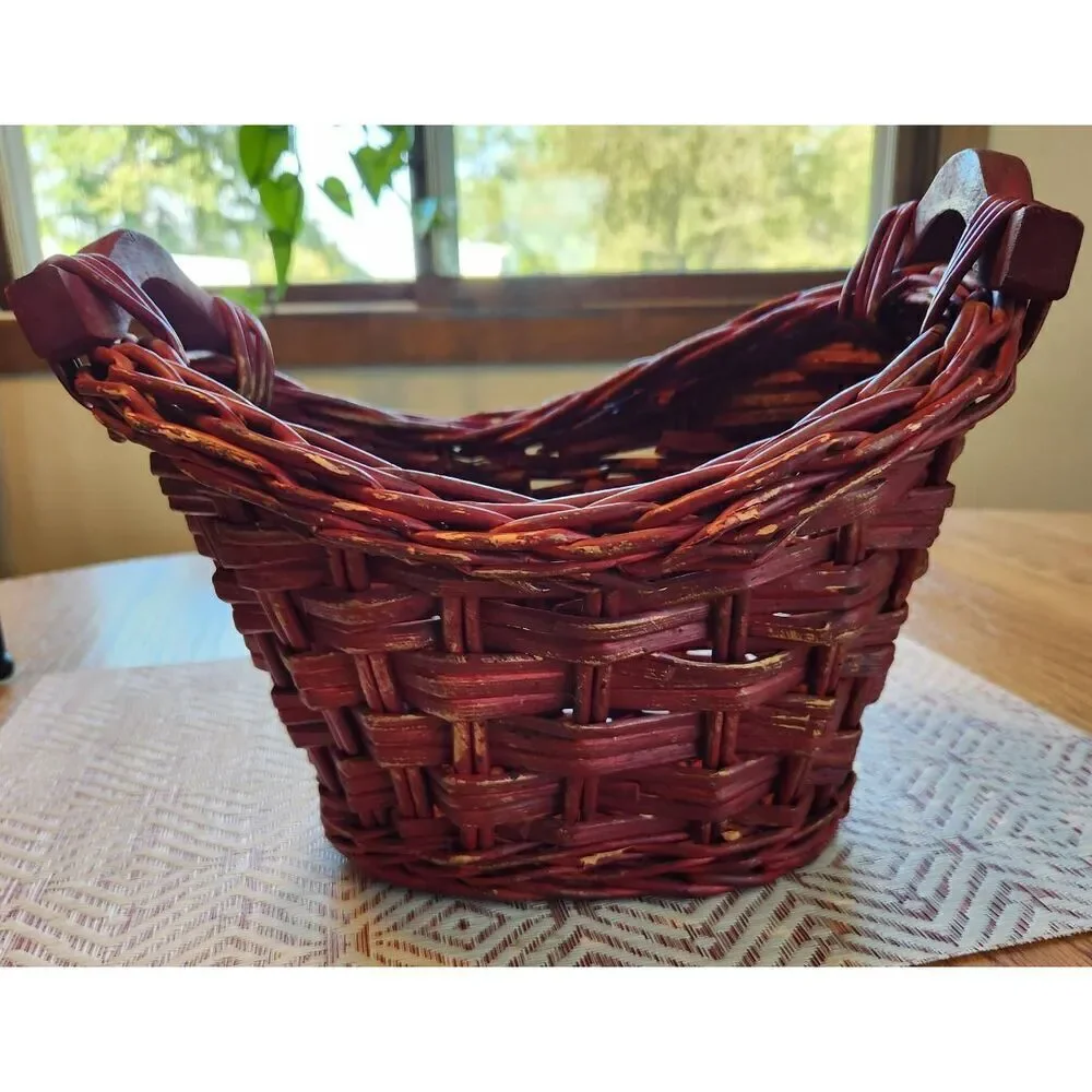 Red basket with wood handles